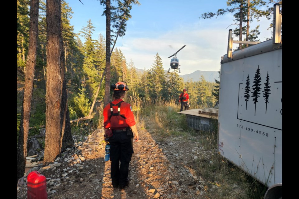BC Wildfire Service crews arriving via helicopter.